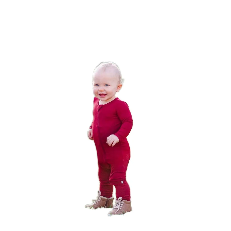 Adorable knitted baby romper in soft pastel tones, perfect for B2B wholesale buyers seeking premium-quality baby apparel for retail stores.