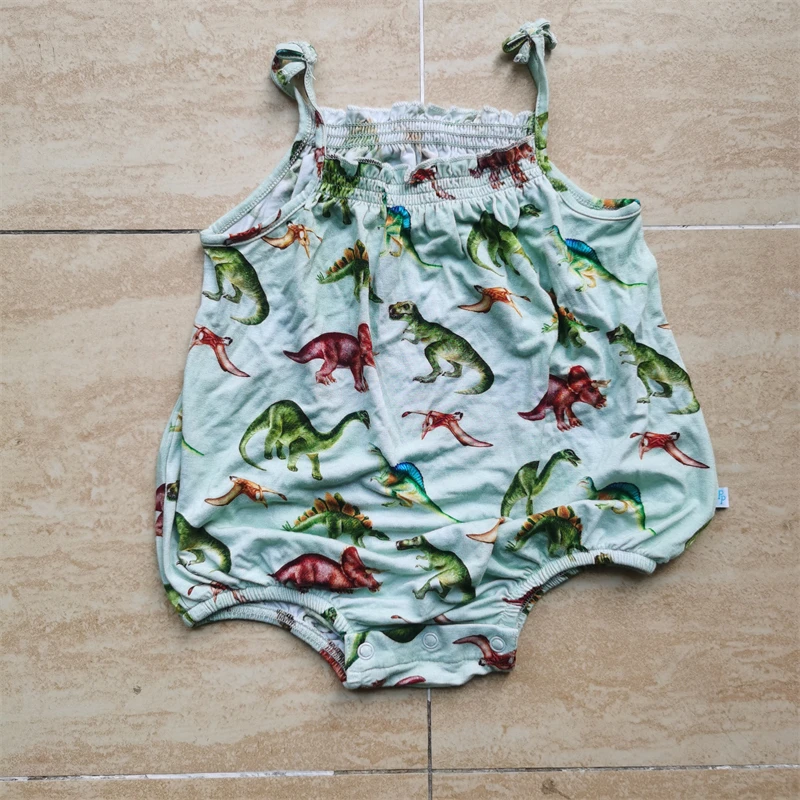High-quality bamboo newborn baby girls' clothes wholesale – custom wildflower romper and bubble pajamas set for B2B buyers.