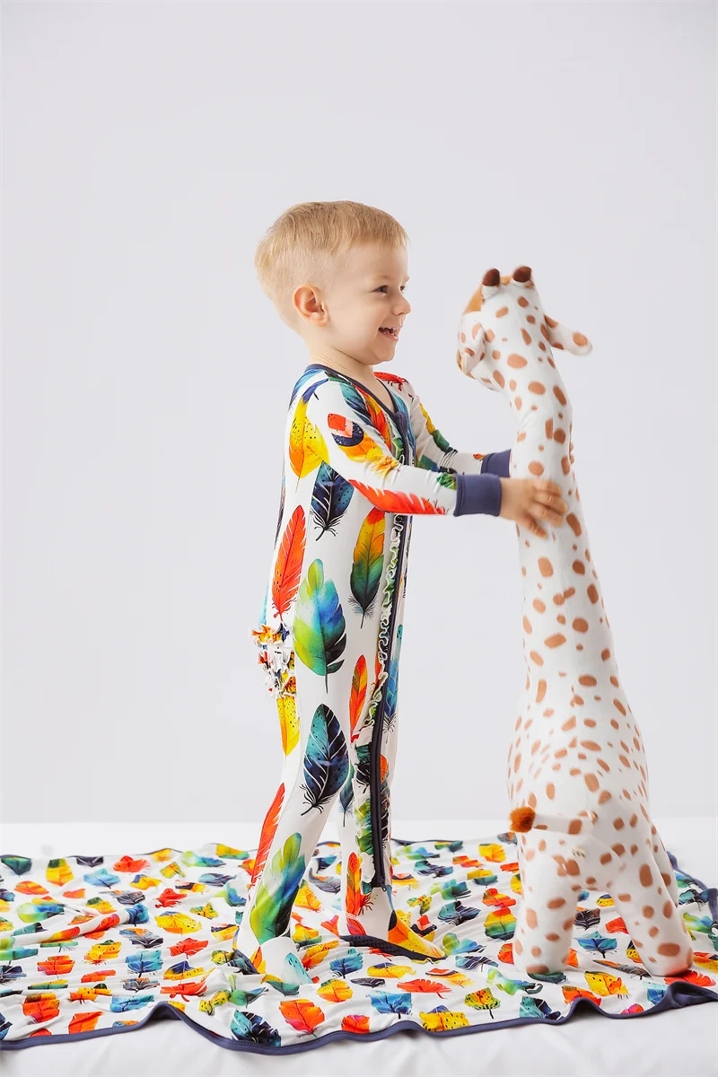 Wholesale bamboo baby zipper print romper with customizable designs, perfect for eco-friendly retailers seeking premium, soft, and sustainable baby clothing.