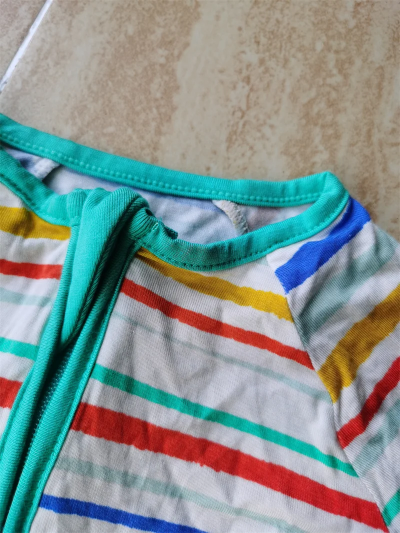 Adorable knitted baby romper in soft, premium fabric, perfect for B2B wholesale buyers seeking high-quality infant apparel collections.